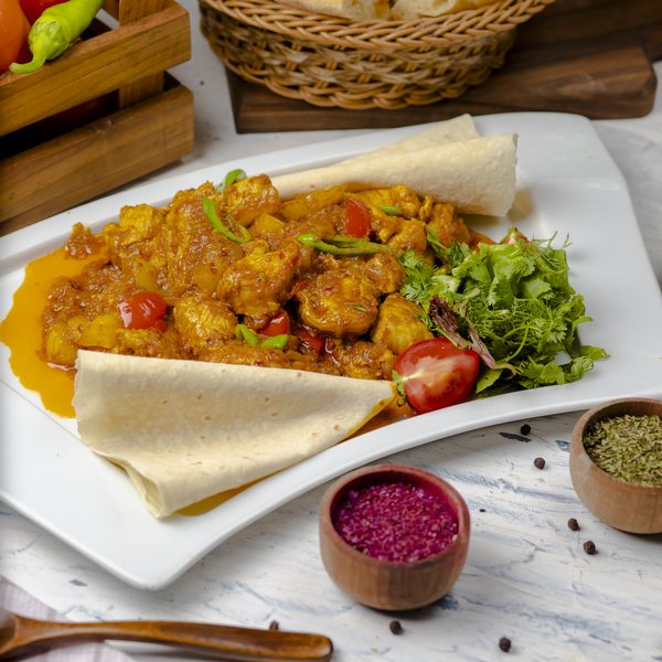 Chicken curry served with flatbread at Rangamati Wokingham